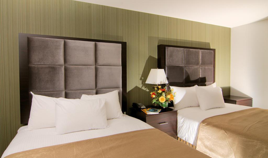 Paradise Inn And Suites Redwater الغرفة الصورة